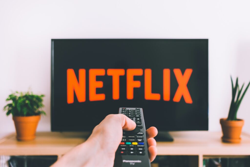 Hobby-related questions for ice breakers section image with Netflix on TV