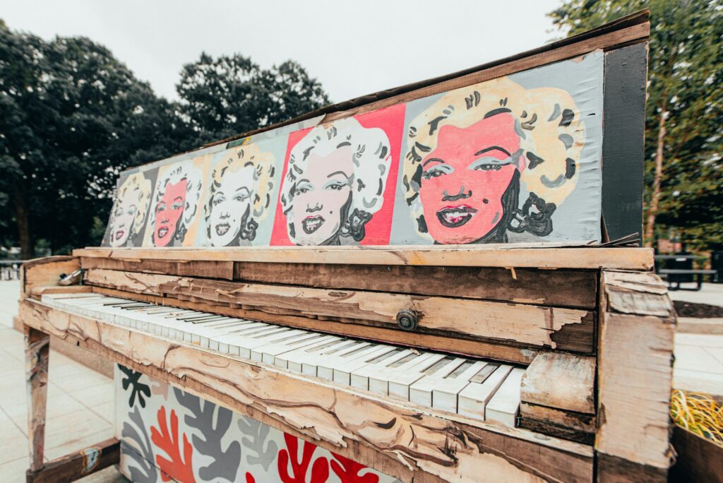 a portrait of marilyn monroe on a bench in raleigh north carolina