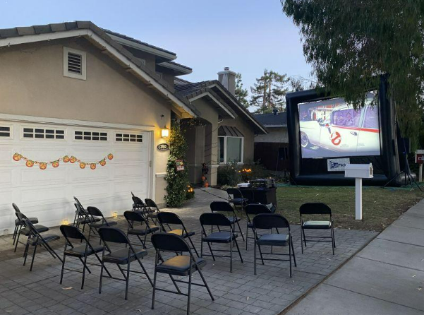 outdoor movie theatre in house driveway