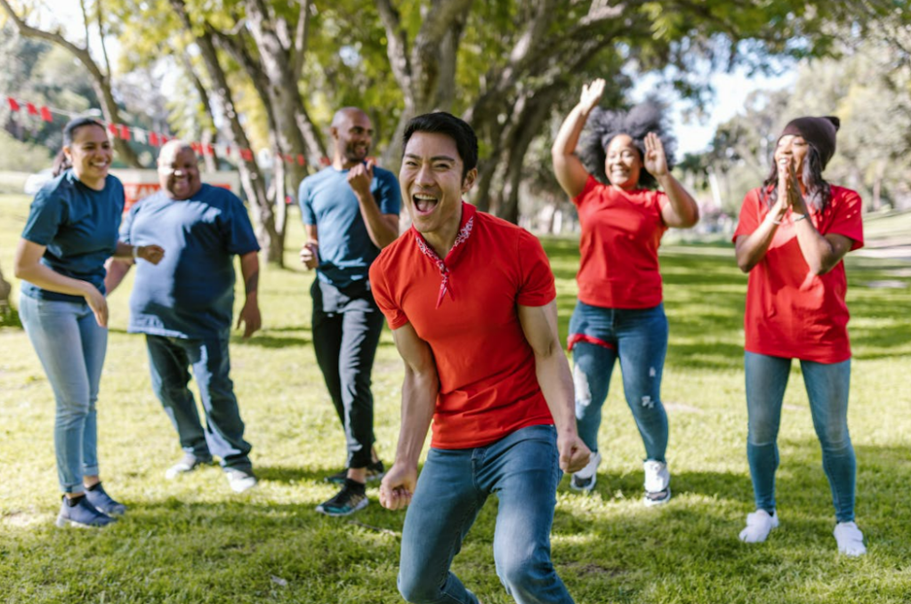 group of people doing team building activity outdoors