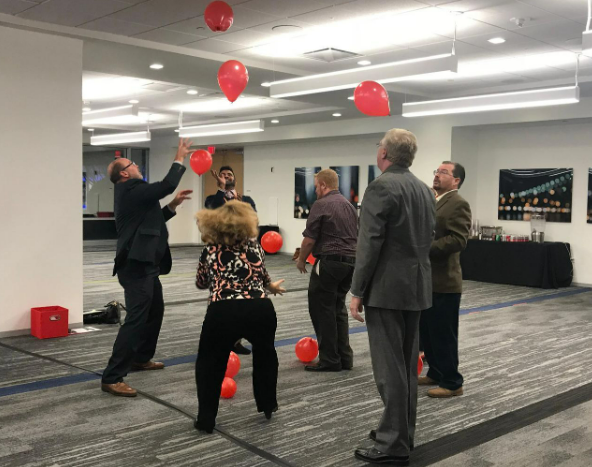 group of people doing a team building activity